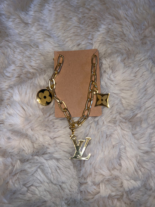 LV Gold Hat Chain